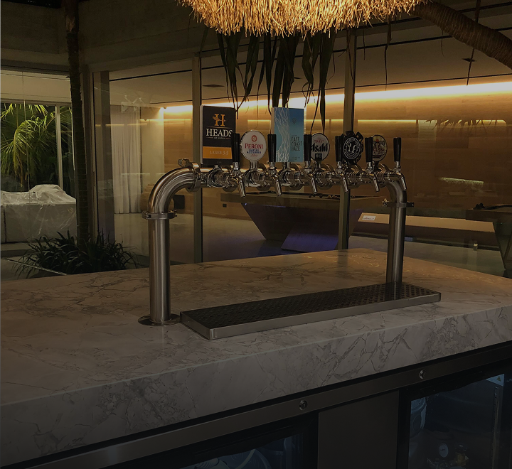 Draught beer pouring fresh from a tap