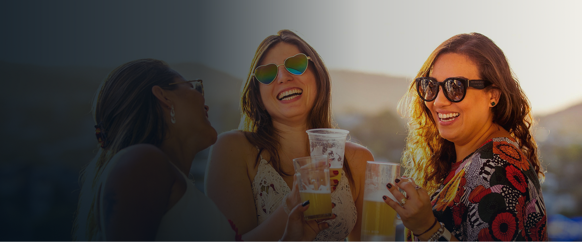 Friends enjoying draught beer together